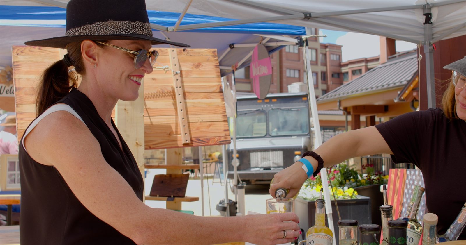 Pouring agave spirits at the Grand Tasting in Breckenridge